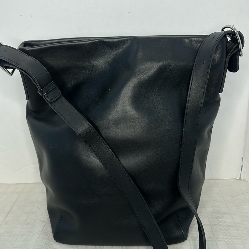 Gloved Black leather bag